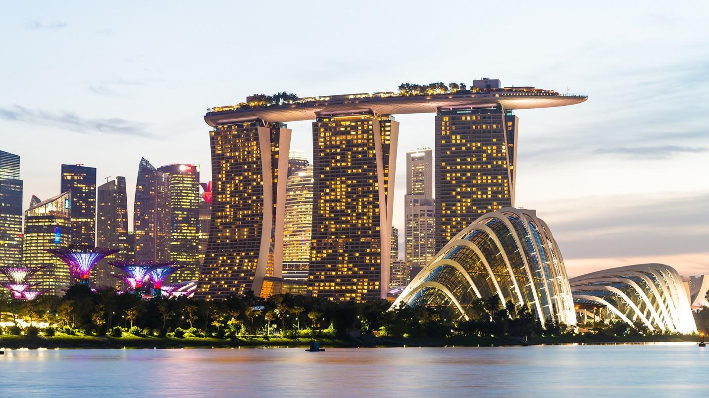 Buildings by the sea in a section about the tax haven of Singapore.
