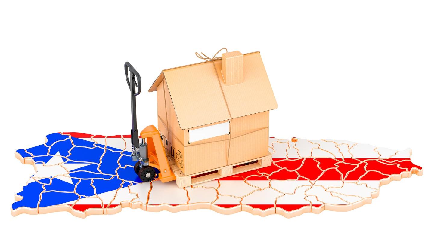 A model house sits on a map of Puerto Rico in a section describing the potential benefits for individuals who relocate to Puerto Rico.
