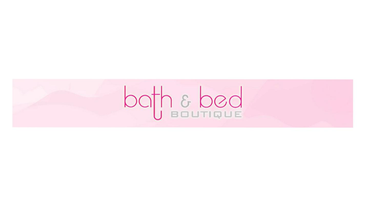 The pink logo of Bath & Bed Boutique in a section about the store’s bath accessories and their prices.
