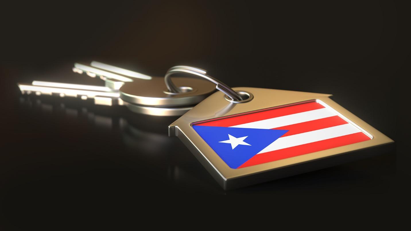 Keys on a keychain with a Puerto Rican flag design in a section describing how to fulfill bona fide Puerto Rican residency requirements.