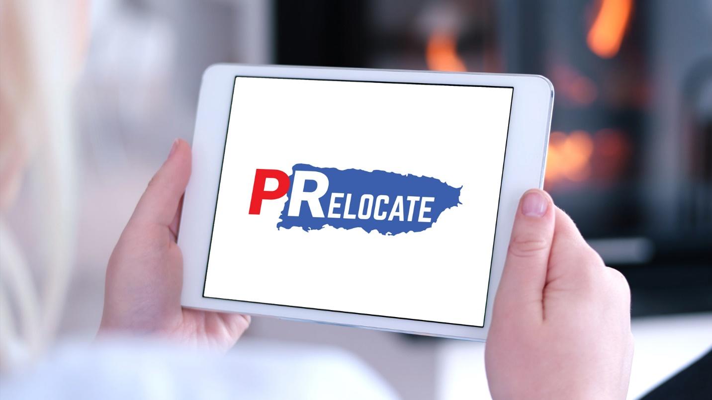 A person holds a computer tablet that displays the logo for PRelocate in a section describing how PRelocate can help readers move to the island and purchase property there.