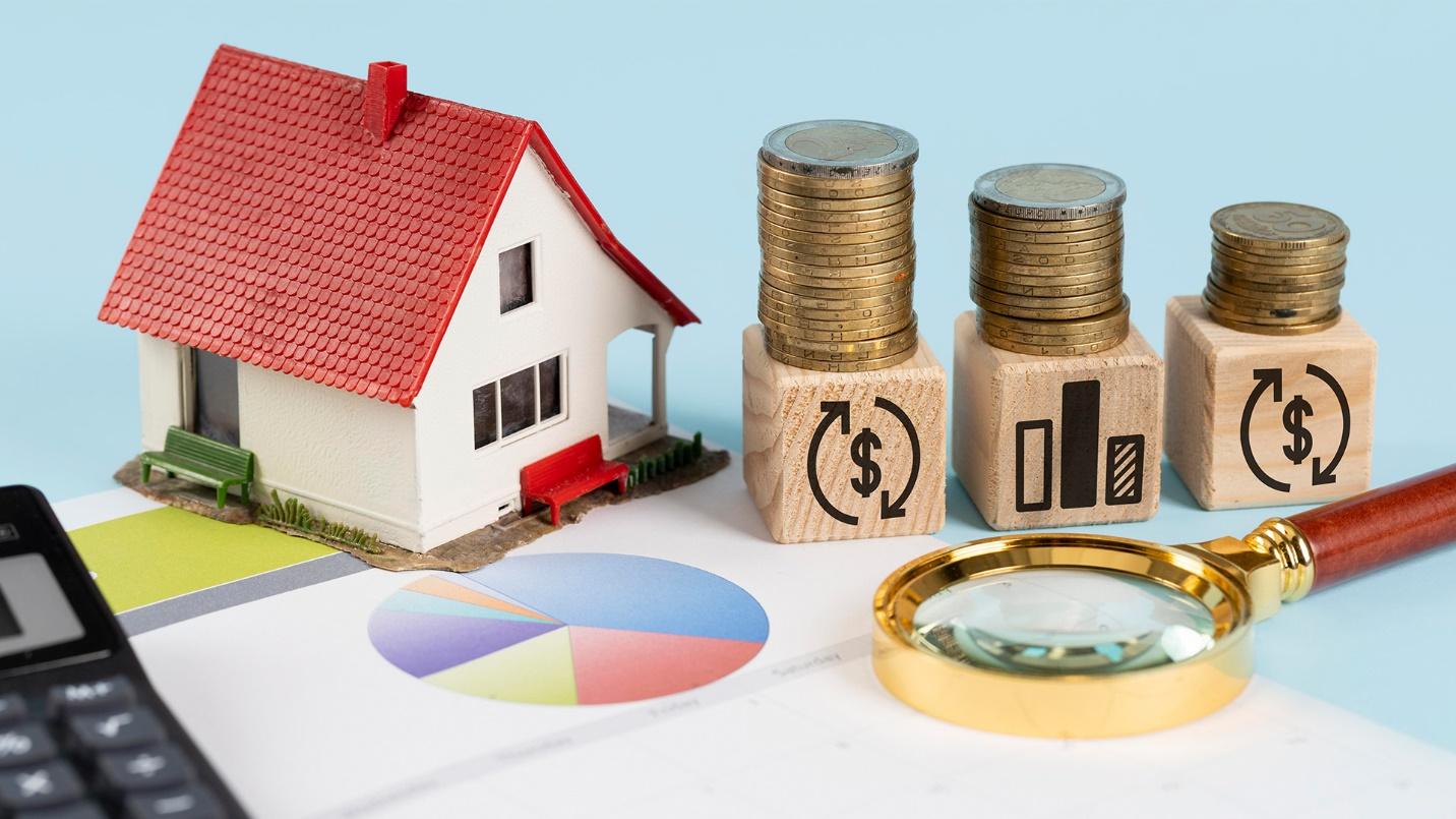 A model house, magnifying glass, charts, and coins in a section about the many benefits of moving to Puerto Rico.
