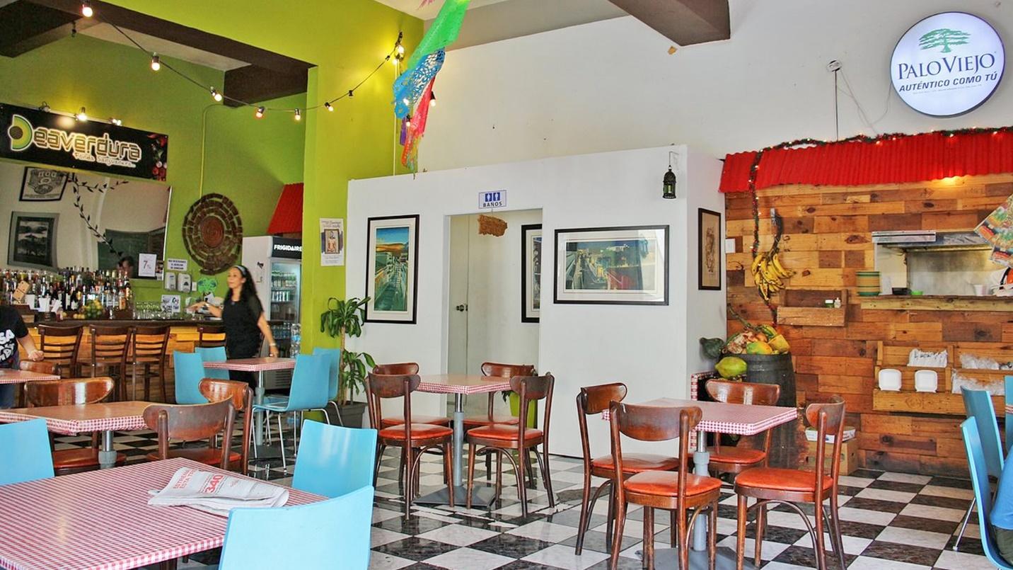 The tables, bar, and restrooms at Deaverdura restaurant in Old San Juan.