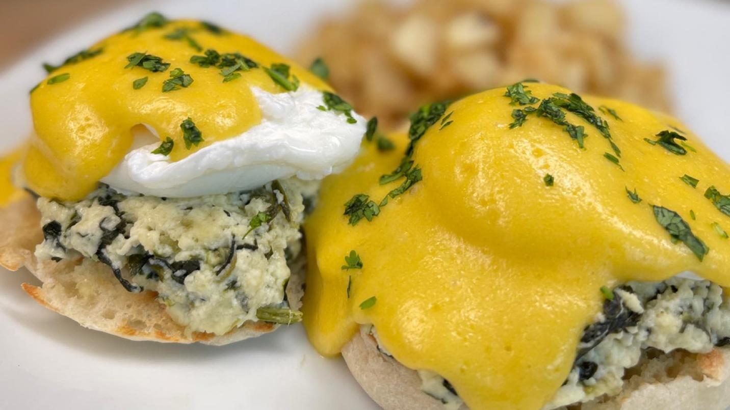 Two eggs benedict in a section about popular breakfast restaurant Pannes in Condado. 