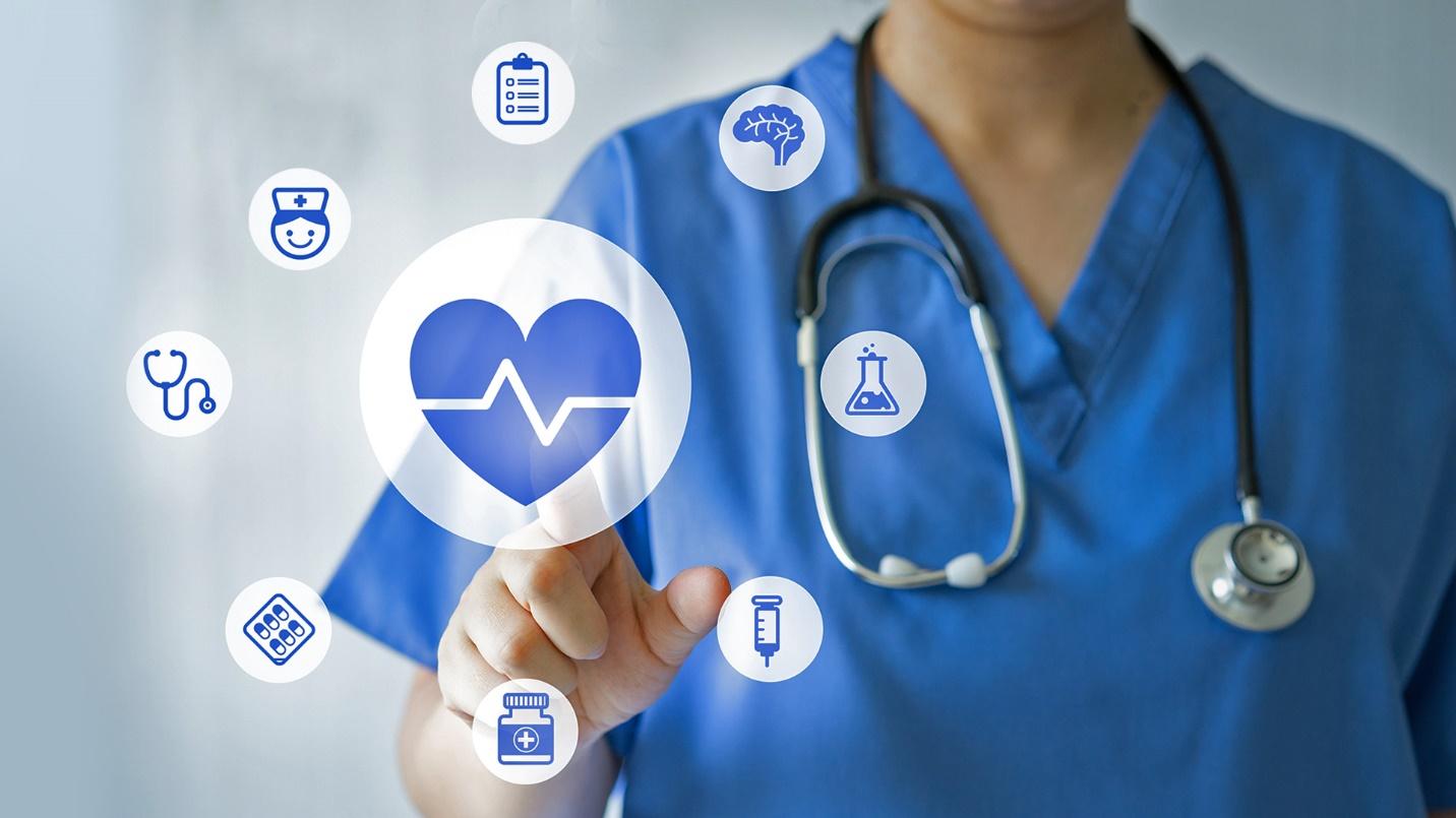 A nurse in blue scrubs points at a heart icon by other health-themed symbols in a section about medical care near Miramar. 