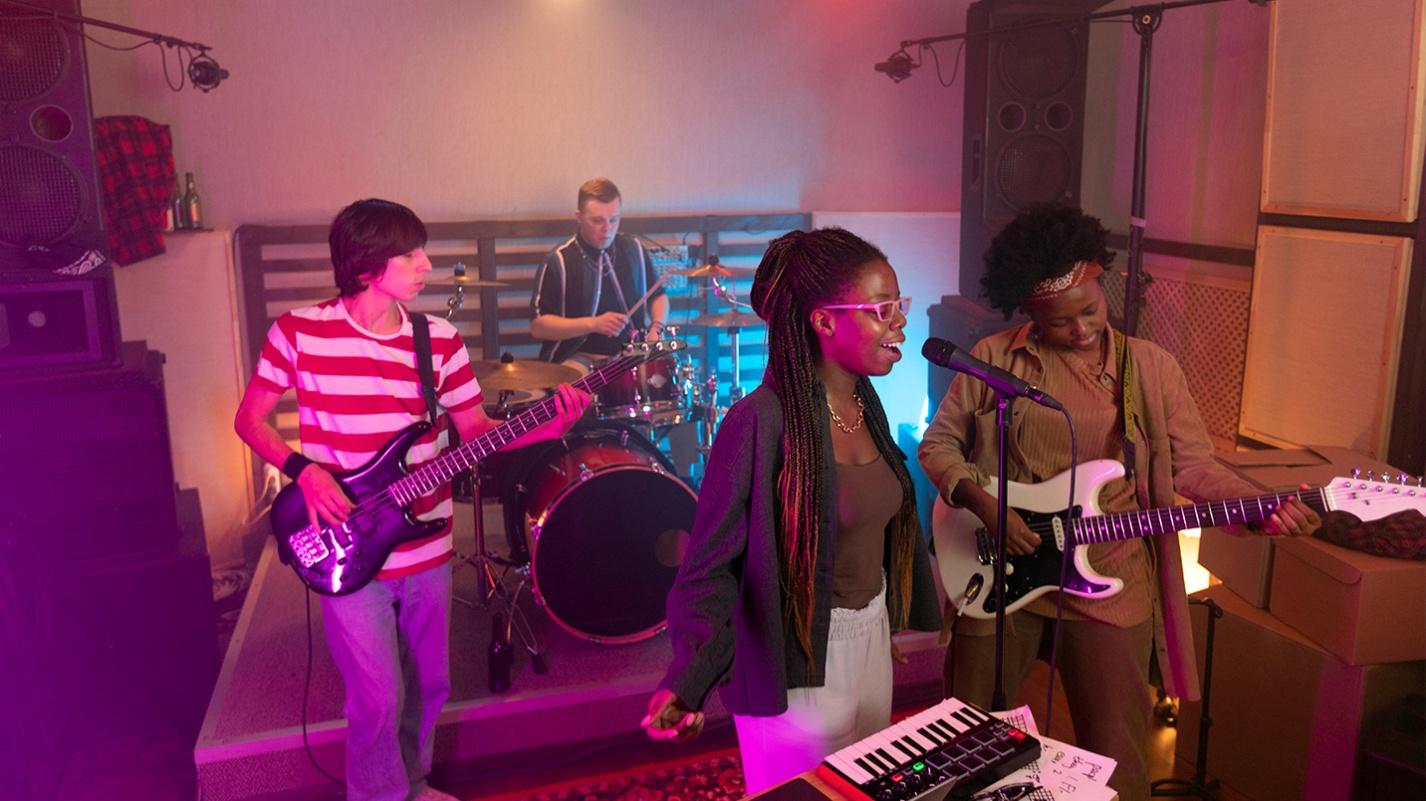 Local musicians performing in a cozy indoor setting in Puerto Rico, showcasing how shared hobbies like music help newcomers connect.