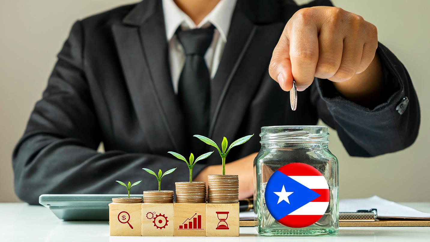 Business professional placing a coin into a glass jar with the Puerto Rico flag, next to stacked coins sprouting plants, symbolizing Act 60 wealth management, tax savings, and investment growth on the island.